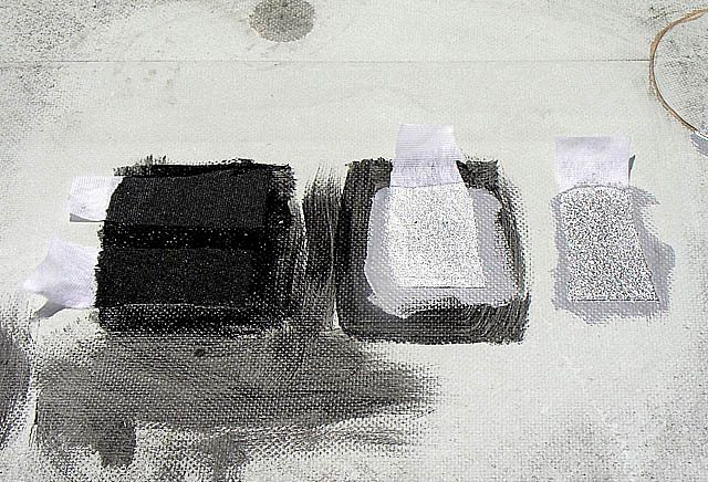 A roof coating adhesion test being performed on a membrane sample